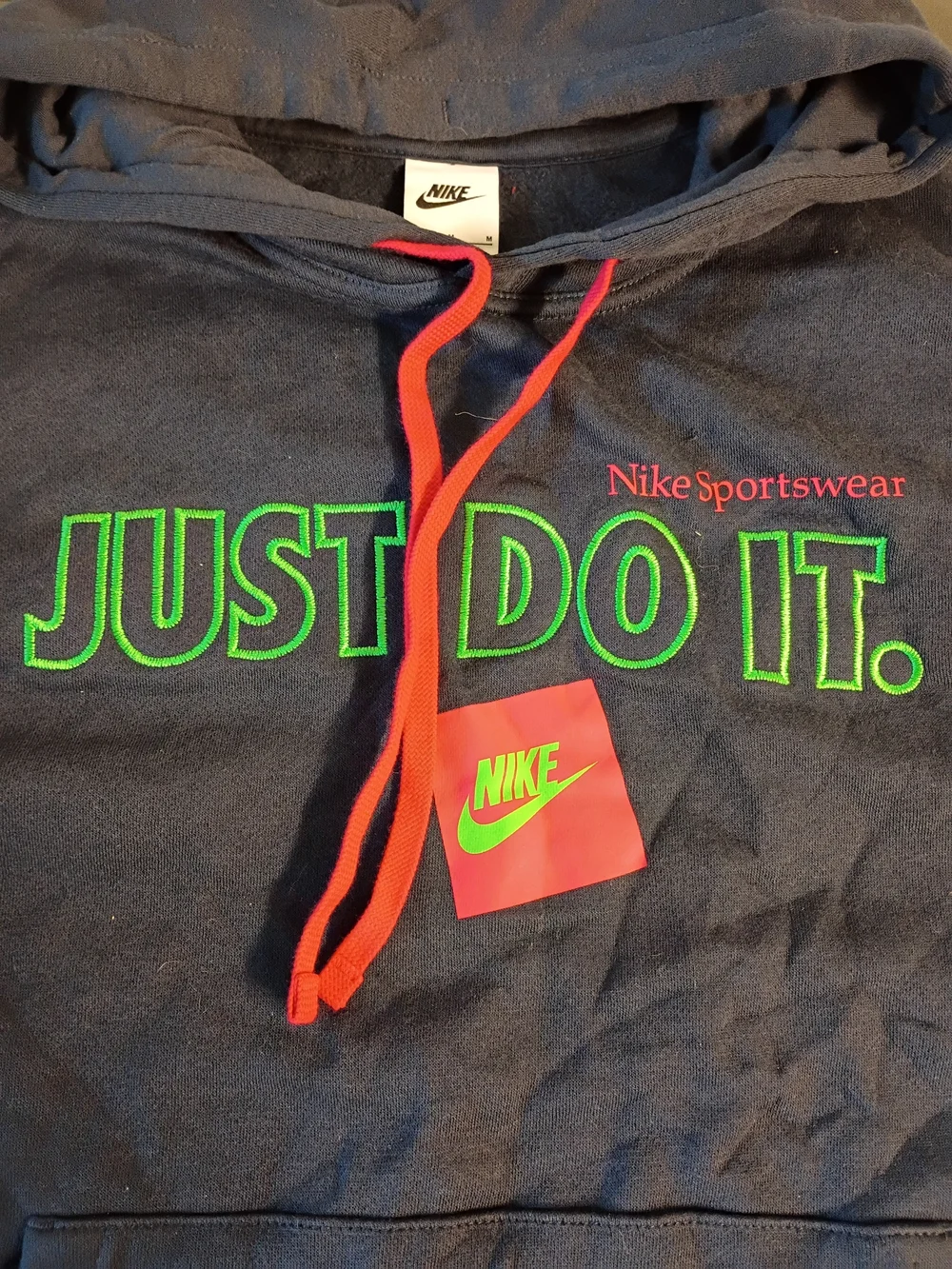 Nike Women's Navy Hoodie with Neon Green 'JUST DO IT.' and Red Accents